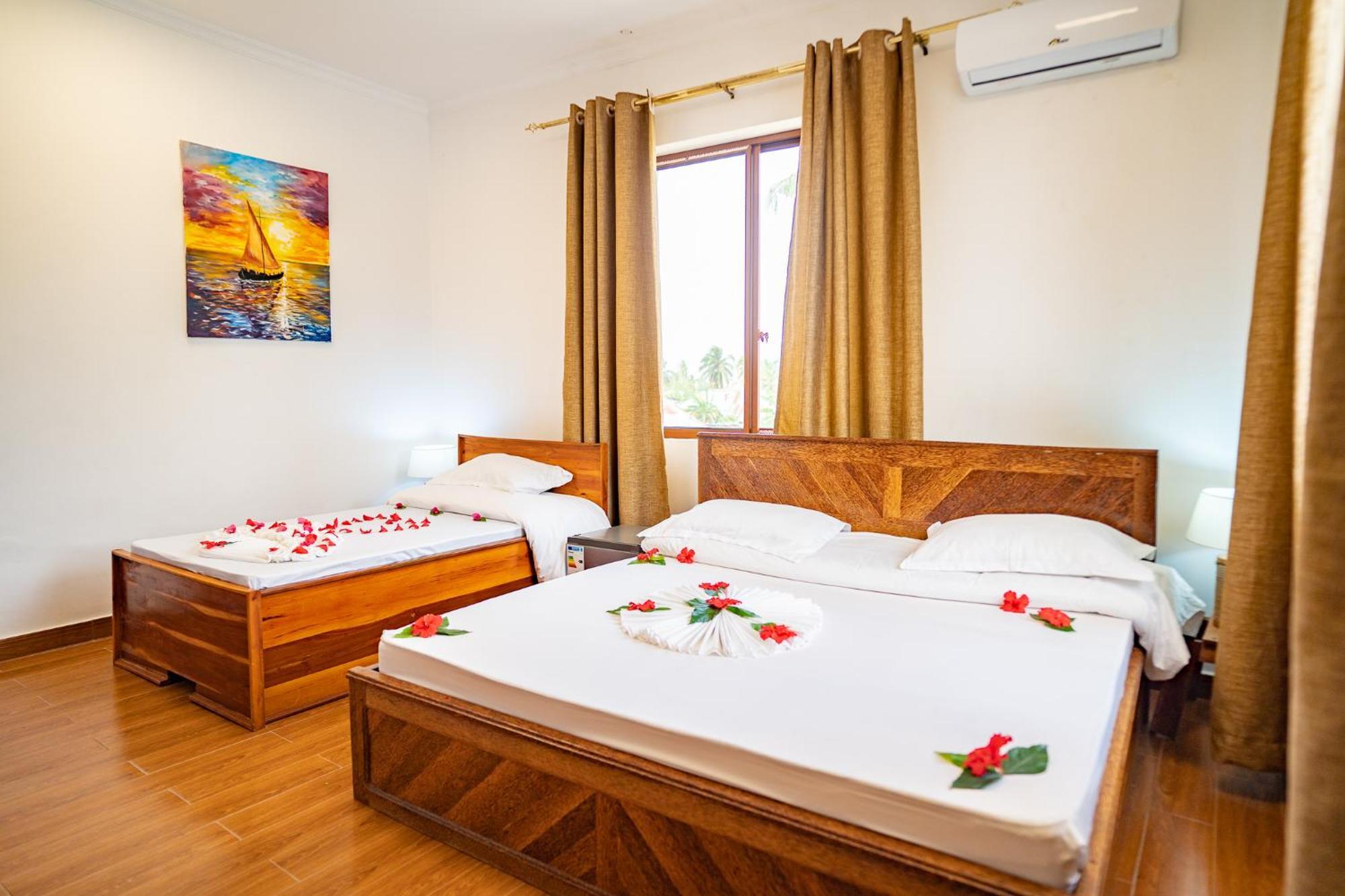 Aurora Beach Hotel นูงวี ภายนอก รูปภาพ